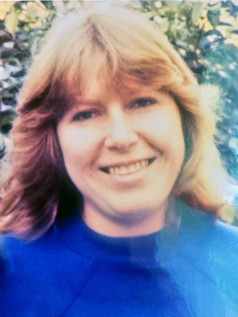 Woman in Blue Shirt