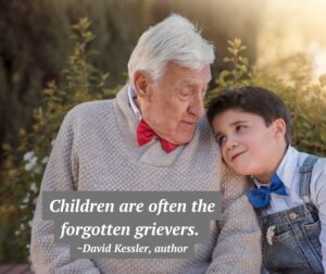 Small boy leaning on the shoulder of an older man with a quote about children and grief.