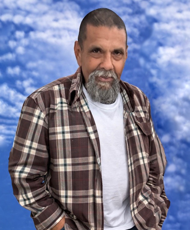 Man in Shirt with Blue Background