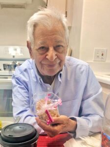 Man Offering Cookies Gift