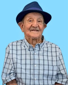 Man in Hat with Blue Background