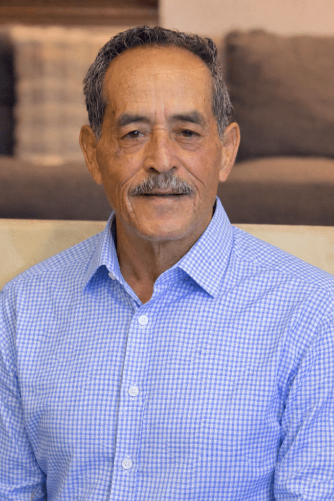 Portrait of Man in Blue Shirt