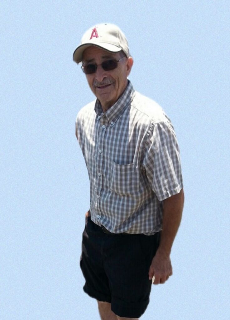 Man in front of blue background