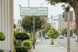 Shows the Hilgenfeld Mortuary Sign that reads since 1927.