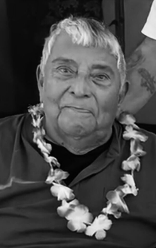 Man with Flower Necklace