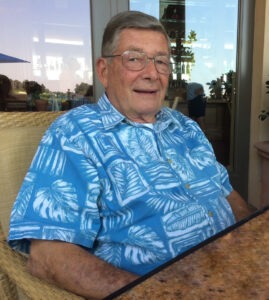 Man in Blue Hawaiian Shirt