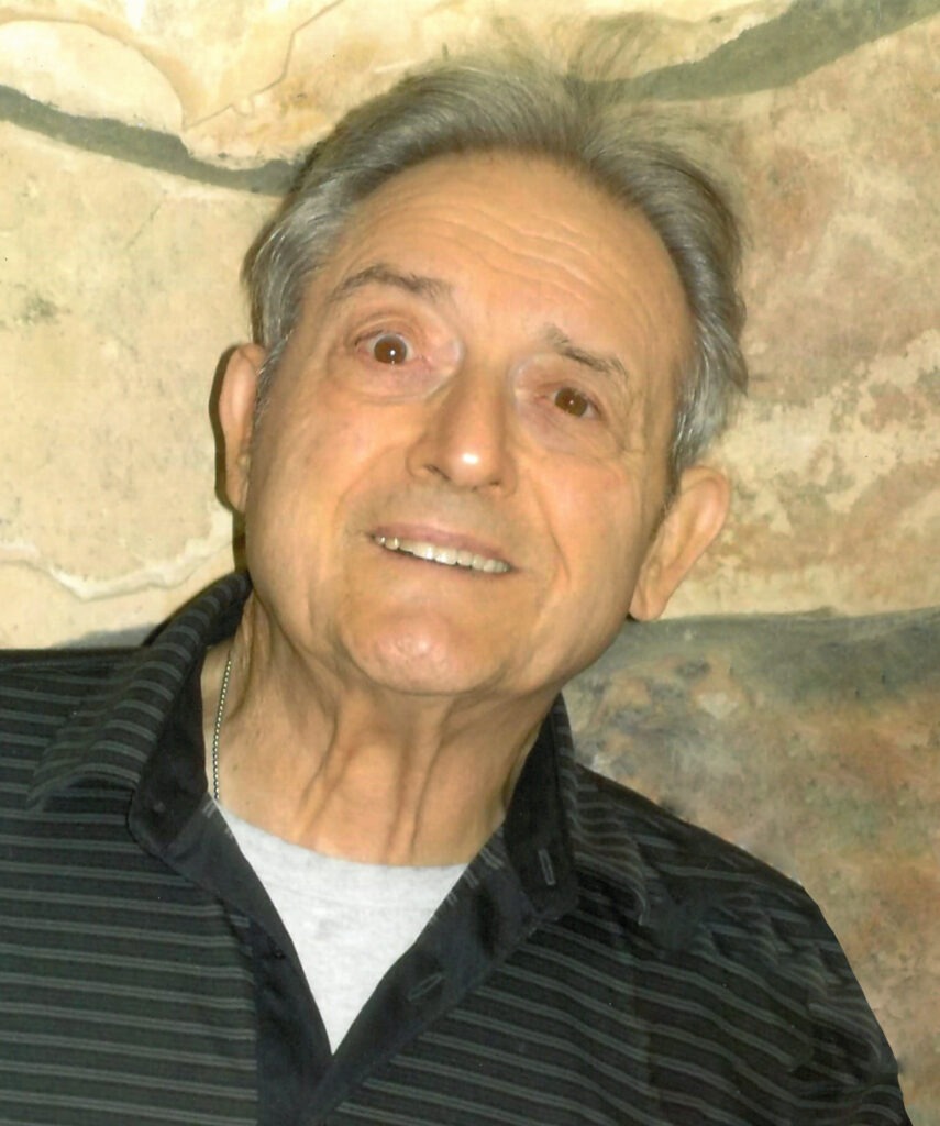 Man in front of wall