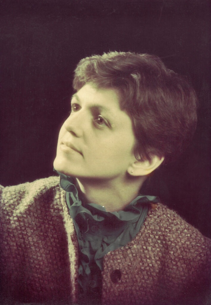 Portrait of a woman with black background