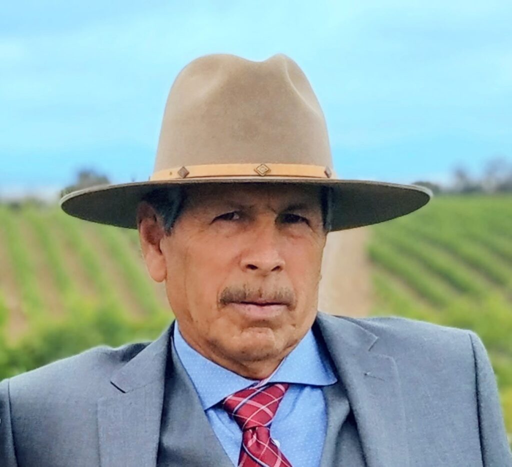 Man wearing a beige hat