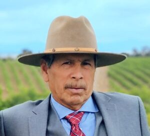 Man wearing a beige hat