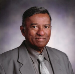 Photo Portrait of a man in a grey suit