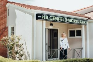 Owner Becky Areias stands in front of the mortuary.