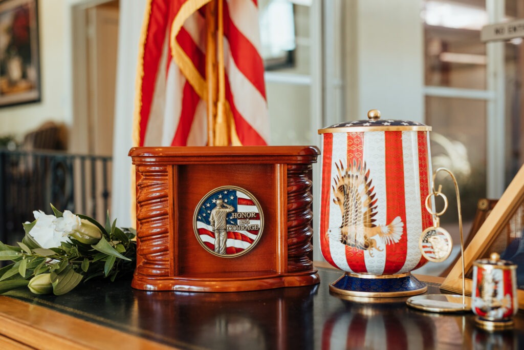 Veteran memorabilia, vase, flag