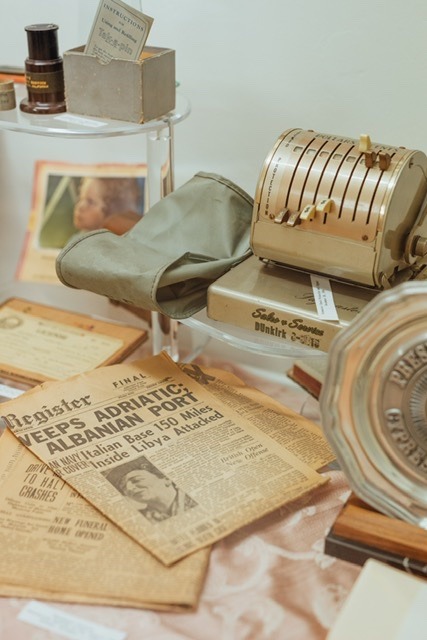 Old Newspaper and Vintage Machine display